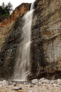 Waterfall behind barrier wall