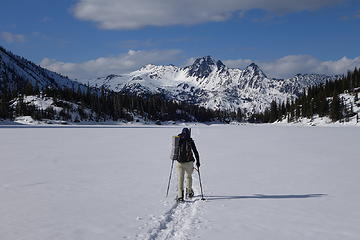 Snowshoeing across Colchuck Lake