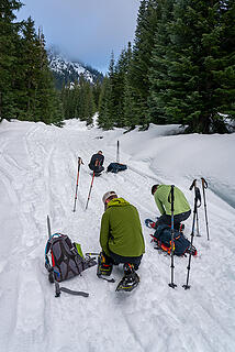 Putting on snowshoes