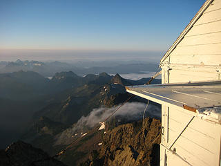 Lookout with fog bending over the ridge below