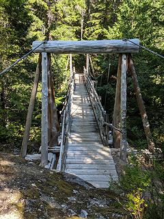 Bridge over Canyon Creek at mile 6; large campsite nearby