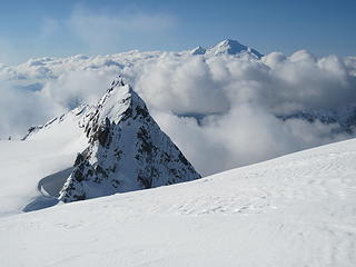 Baker stands watch above the clouds.