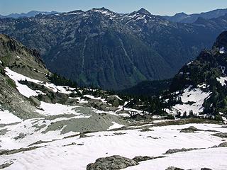 Looking across Moraine debris field, Hyas Lake / Cle Elum River Basin at Tuck, Robins Lake area, Granite, and Trico Mtns.