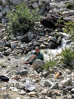 Nancy dips in the stream