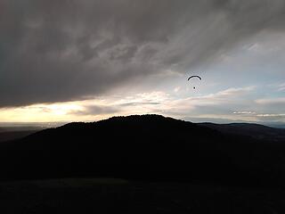 a brave paraglider above squak