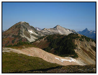 View west from Hannegan Peak.  Granite Mtn on left, Peak 7020' on right. Easy walking and a little scrambling all the way there. 
10/1/2008