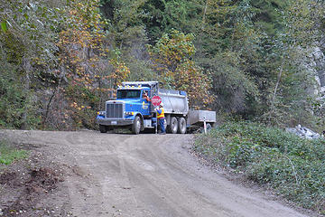 An asphalt truck at the CCC trail intersection. We waited 50 minutes here for an pilot car to take us past the construction area.