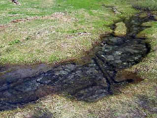 awesome creek, undercutting the surface on both sides