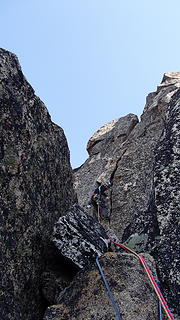 Daniel enjoying the fun (but short) twin cracks on pitch 5.