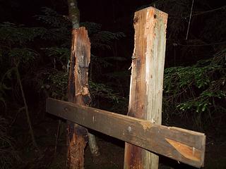 old trailhead sign on the overgrown road ~1500'