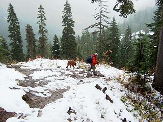 Progress slows as we make our way up a very rough trail now covered with snow.