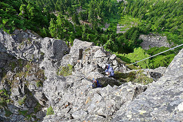 Martin rappelling off Bessemer. Loose sling below is old stuff we cleaned out from below the summit block (we carried it out)