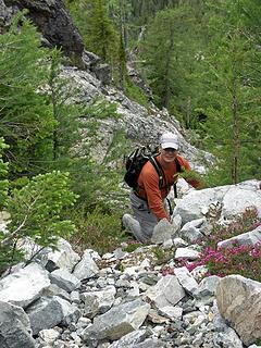 Steve P. working up a short section of class 3 rock from the initial gulley route we took.