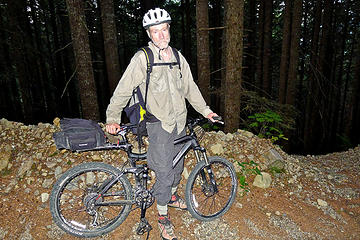 Martin bemoans his flat front tire, robbing him of a hard-earned thrill ride down the Bessemer road.