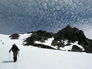 Puffy clouds over the summit