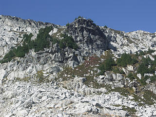 From the SE ridge approach we crossed a boulder and snow field over to the vegetated ramp and took steep slopes to the ridge and over heading back S to Mt. Sauls summit (class 2)