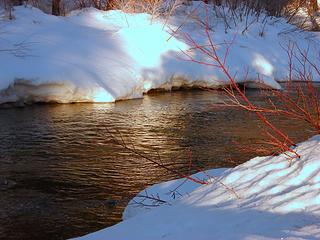 First Rays of Sun on the River