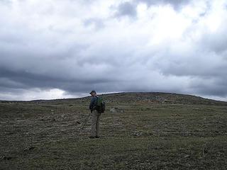 Jim crossing the vast expanse of the "tundra" between the American and Canadian summits of Armstrong
