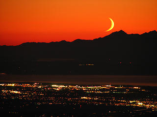 Sunset and the Crescent Moon over Puget Sound From Three Fingers