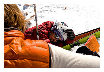 Christy taking a moment on the summit...for the moment smiling.