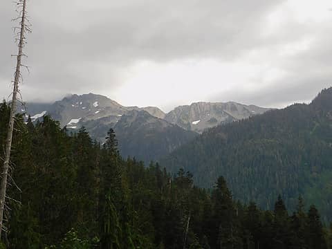 Mt Skokomish and Mt Henderson about to be covered by clouds on the way back out