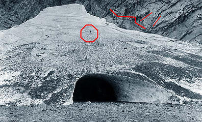 Big Four Ice Cave in (fall) 1920. ...... Man standing on glacier (circled) for scale.