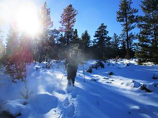 Leaving a wake as he steam rolls the snow to the high point