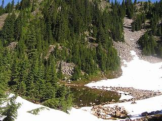 Red Pond with snow around the shore