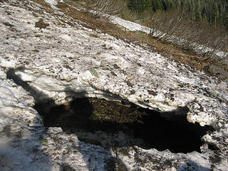 One of many threatening snow holes along the trail