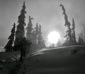 Snowshoers approach Maple Pass through mist in North Cascades National Park.