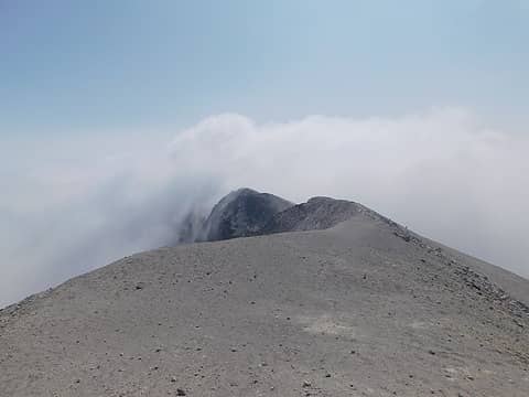 looking back toward the crate edge where the route first meet it, from the true summit (such as it is now)