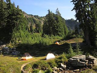 Our home for the evening, with a nice flat rock for drying off clothes or people