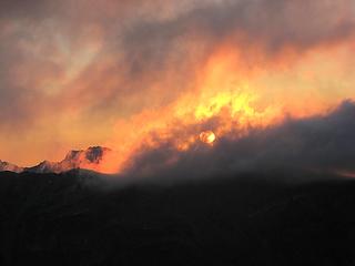 Sun rising in clouds near Buck Mtn