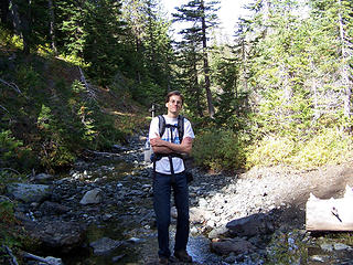 Todd at stream crossing, attempting EK pose.