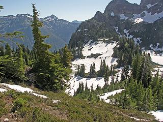 Gainig the lower SE ridge with a frozen Peggy's Pond to the right.