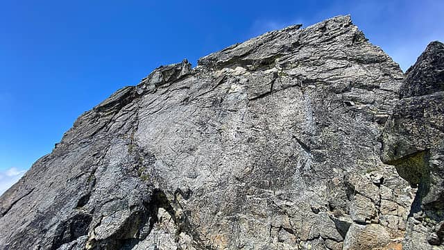 Looking up at the summit block. The route is the fault line feature moving from bottom right to top left