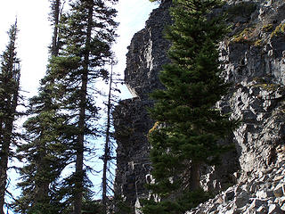 rocky cliffs above the trail