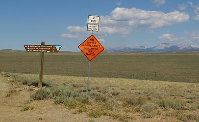 The start of the Lander Cutoff road at South Pass.  Evidently the WY Highway Dept. is a bit confused as to the duration of winter.  I'm inclined to favor the white sign.