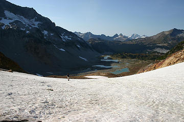 Looking down the snowfield at the Lyman Lakes Basin