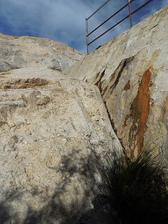 Climbing back up the dam where we did so as kids