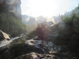 Jake climbing the waterfall slabs