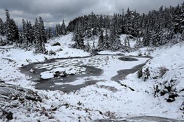 My favorite Rampart tarn with its island and snow patterns