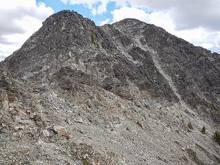 summit visible at right, loose traverse options below