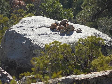 Pile-o-rocks atop boulder