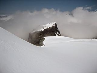 Nesatin Pk emerging from the fog