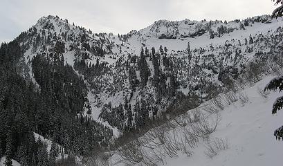 Route up the ridge   angling below rock bands from right middle up to center top, then over the high point in the center