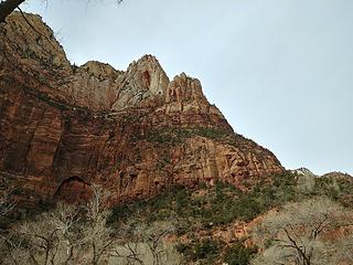 Lady Mountain from the parking lot. The route starts on the bottom right, climbs the first cliff band, traverses left above and through the cliffs, then gains the right-trending gully and follows it to the summit ridge