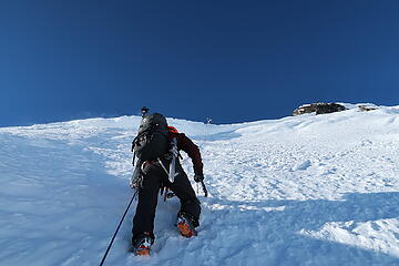 Fred making his way up the crux with Dustin belaying