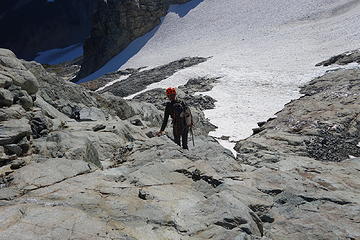 Descending slabby rock behind Dark Fin Tower to gain the glacier