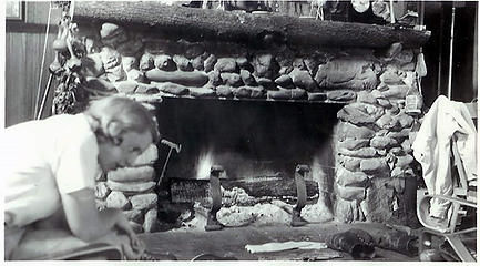 Smith Place - Queets Valley - Marion V. Wood in front of fireplace on north wall of Smith addition - photo courtesy L. Vaughan
